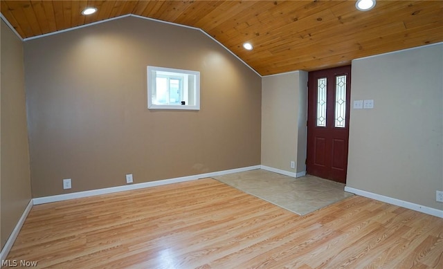 entryway featuring wood ceiling, lofted ceiling, and light hardwood / wood-style floors