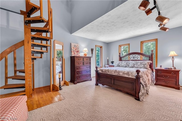 bedroom featuring a textured ceiling