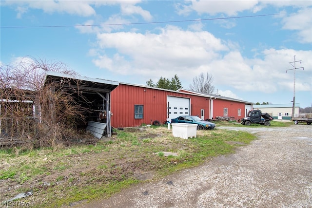 view of outdoor structure featuring a garage