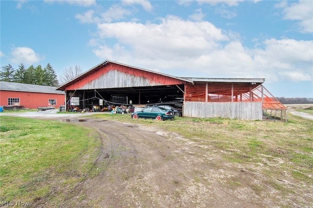 exterior space with an outbuilding