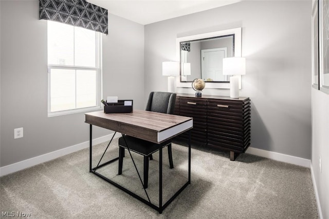 home office featuring plenty of natural light and carpet floors