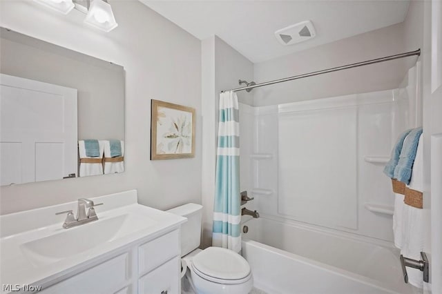 full bathroom featuring vanity, toilet, and shower / bathtub combination with curtain