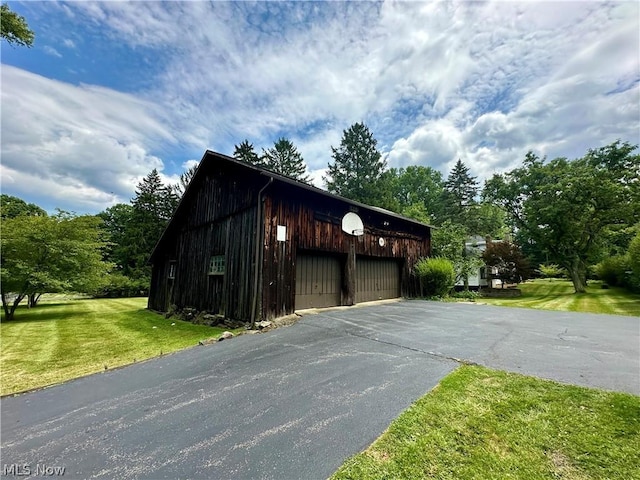 garage with a lawn