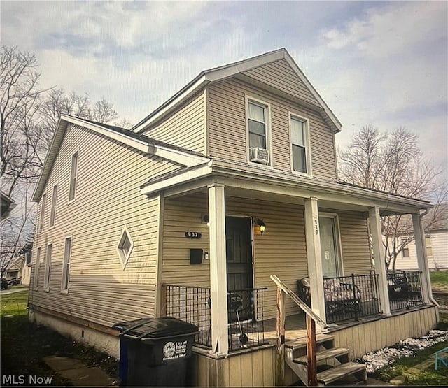 view of front of house with covered porch