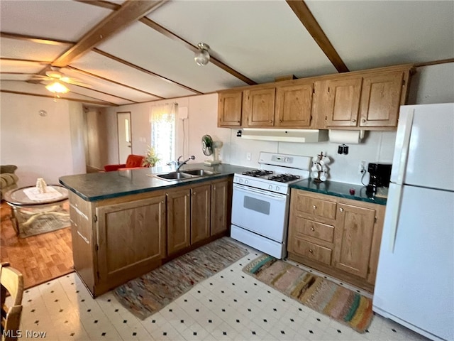 kitchen with white appliances, sink, ceiling fan, range hood, and kitchen peninsula