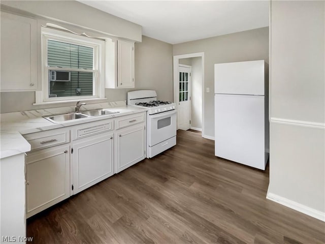 kitchen with white cabinetry, white appliances, dark wood-type flooring, and sink