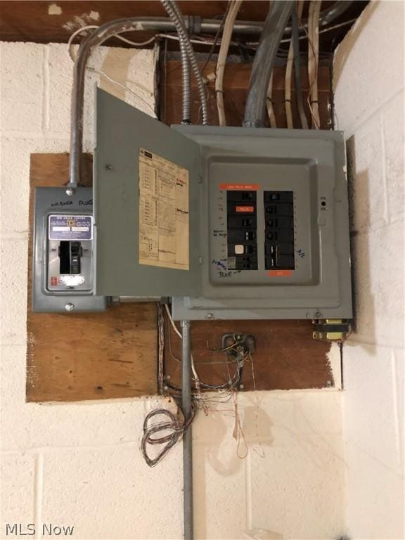 utility room featuring electric panel