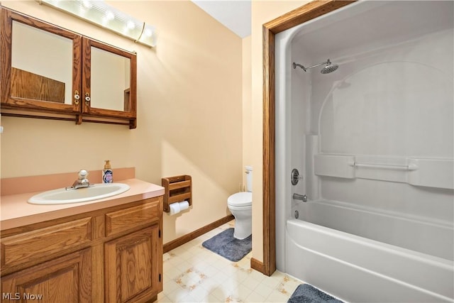 full bathroom with vanity, toilet, and washtub / shower combination