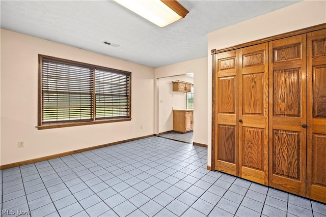 interior space featuring light tile patterned flooring