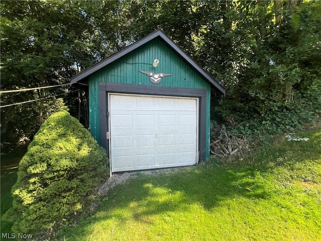 garage with a yard