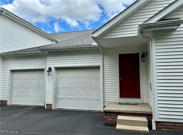 entrance to property with a garage