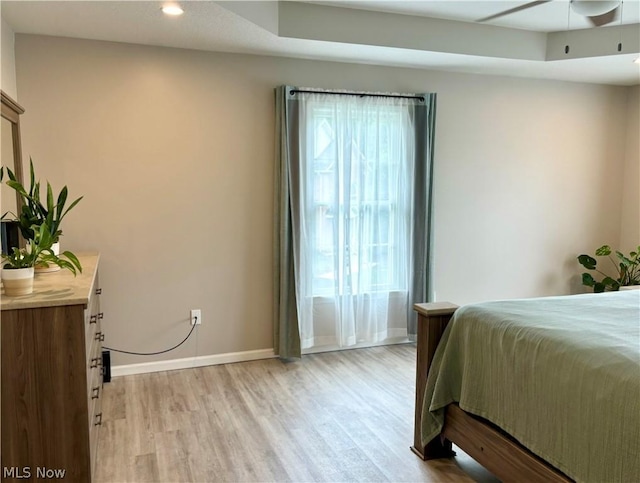 bedroom with light hardwood / wood-style flooring