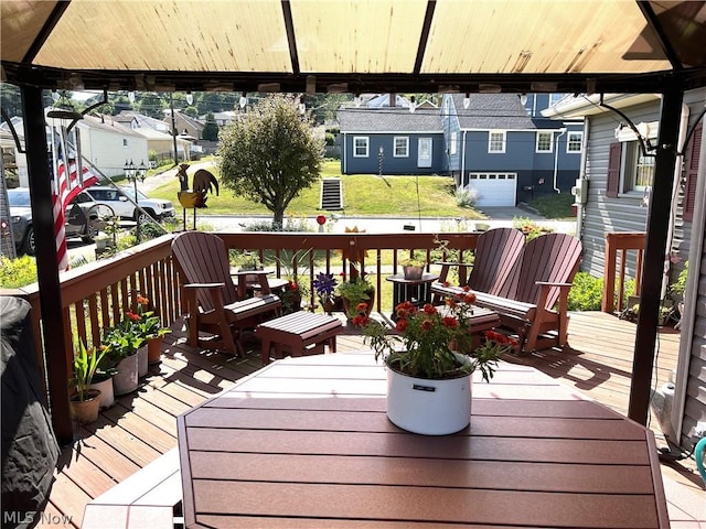 wooden terrace with a residential view