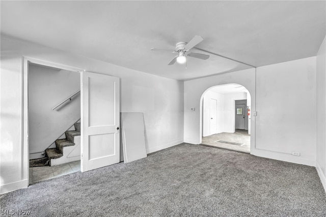 unfurnished room featuring carpet flooring and ceiling fan