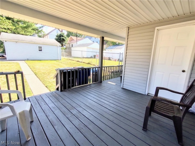 deck featuring a lawn