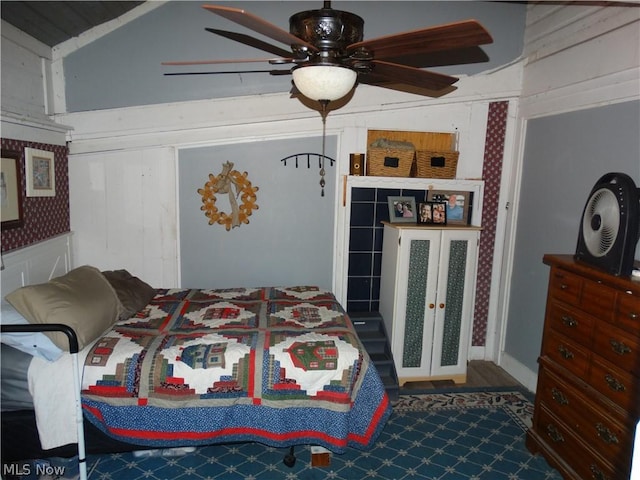 bedroom featuring ceiling fan and french doors