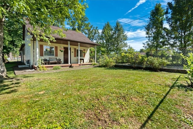 view of yard featuring a porch