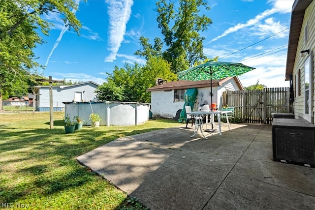 view of patio / terrace featuring a fenced in pool