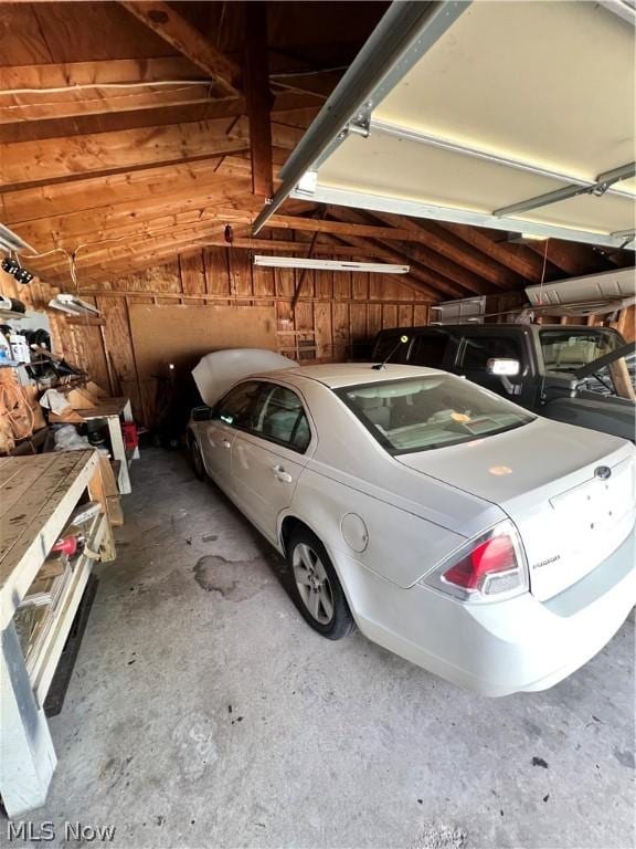 garage with wood walls