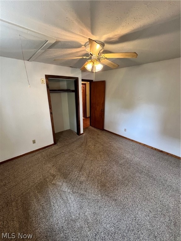 unfurnished bedroom featuring ceiling fan and carpet flooring