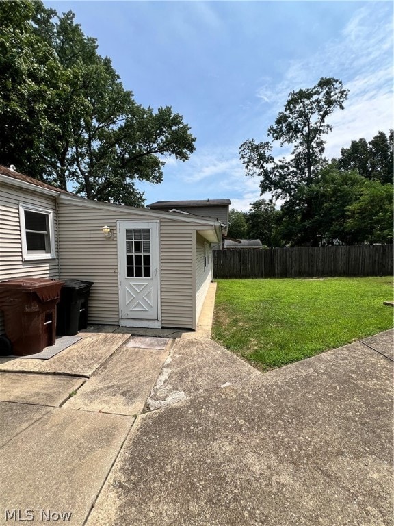 garage featuring a yard