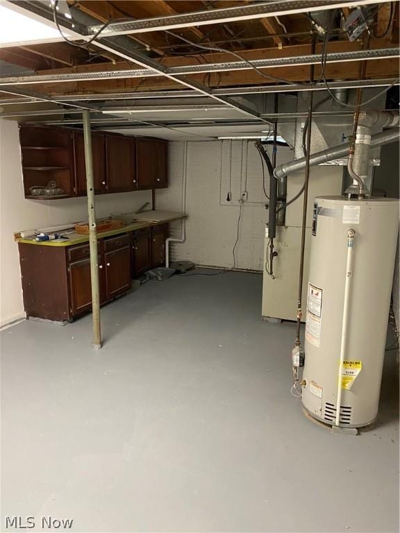 basement with heating unit and gas water heater