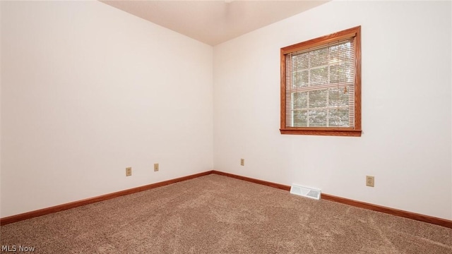 empty room featuring carpet