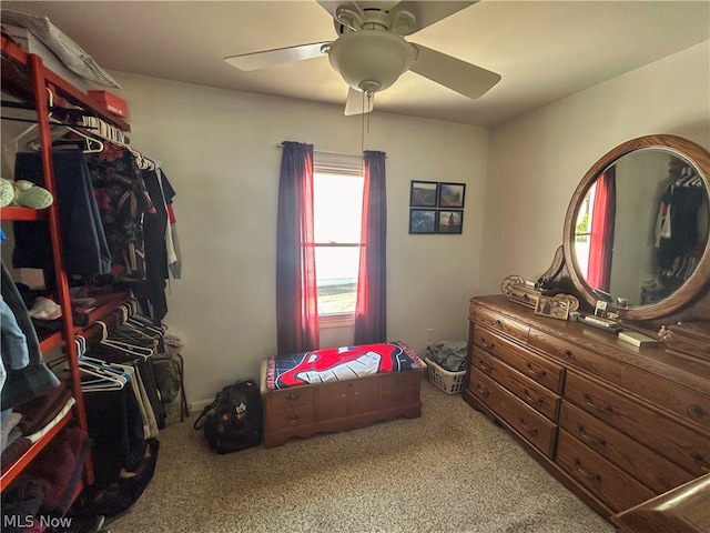 bedroom featuring carpet and ceiling fan