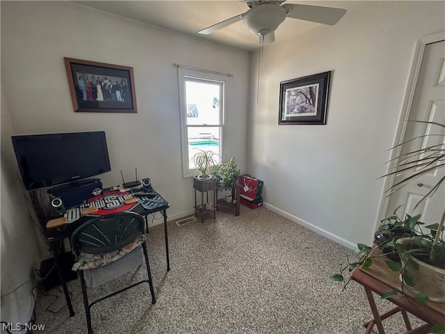 office space with ceiling fan