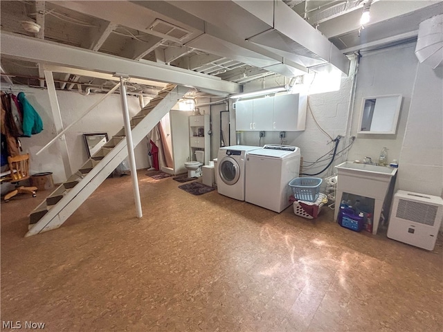 basement featuring independent washer and dryer