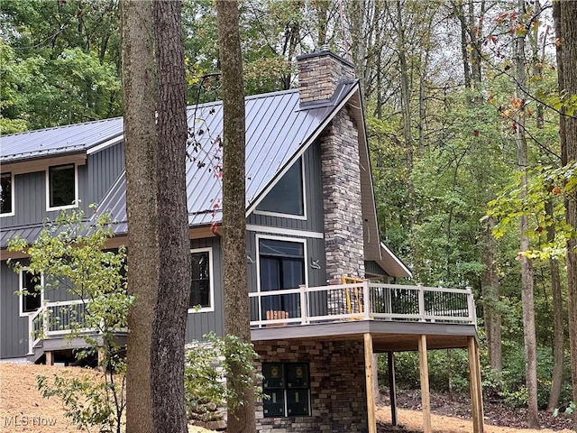 view of home's exterior featuring a deck