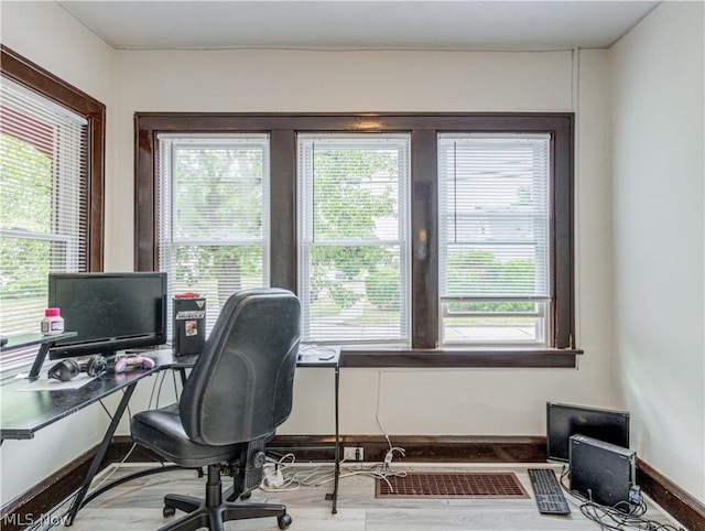 5521 W 48th St, Parma, OH 44134 - office with plenty of natural light, baseboards, visible vents, and wood finished floors