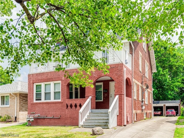 view of front of property with a carport