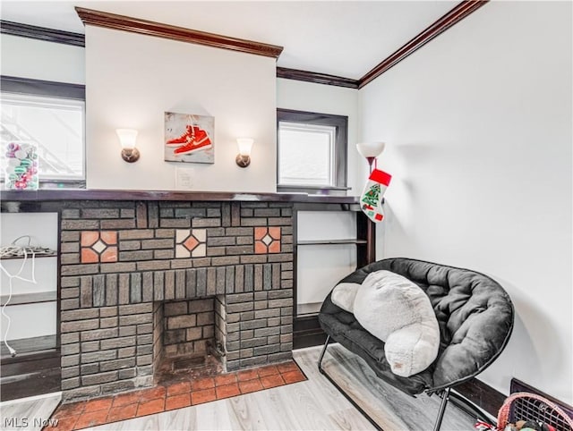 5521 W 48th St, Parma, OH 44134 - room details featuring ornamental molding, wood finished floors, and a brick fireplace