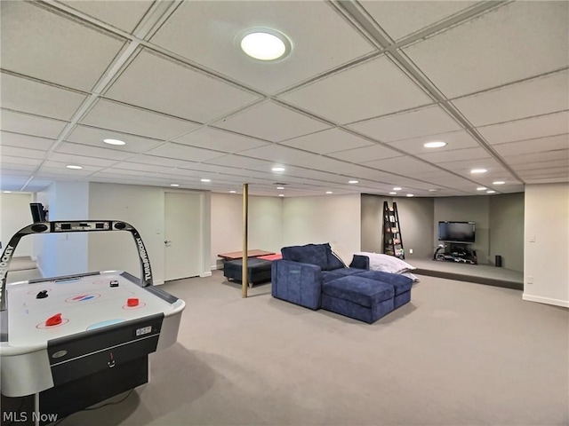 recreation room with carpet flooring and a drop ceiling