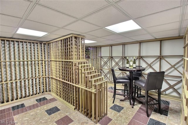 wine room with a drop ceiling