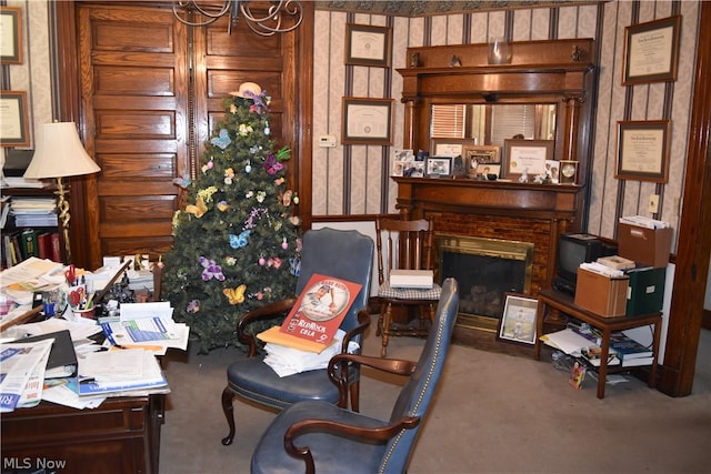 office featuring carpet and a brick fireplace