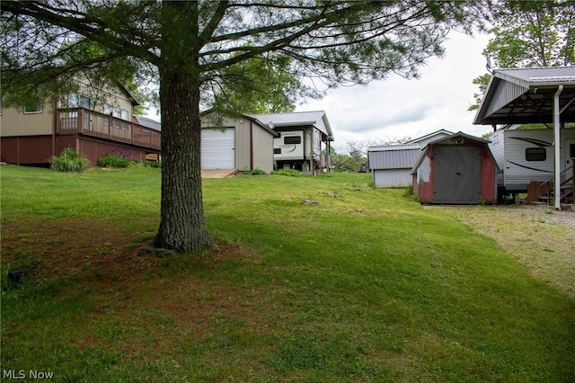 view of yard with an outdoor structure and a storage unit