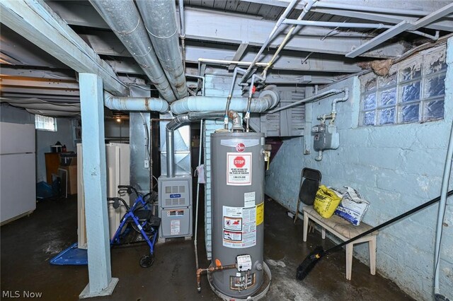 utility room with gas water heater