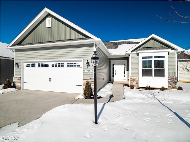 craftsman-style house featuring a garage