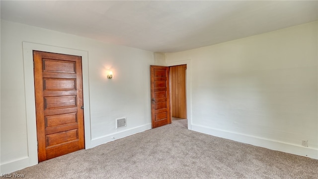 empty room with carpet floors