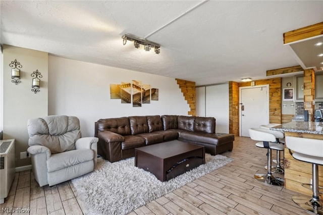 living room with light hardwood / wood-style floors