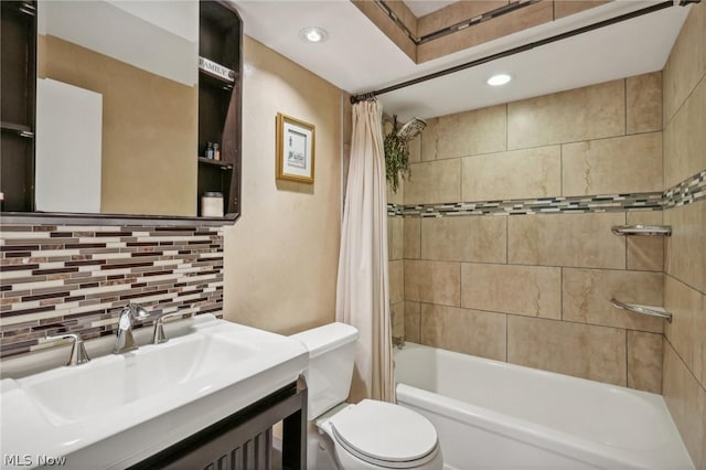 full bathroom with shower / bathtub combination with curtain, backsplash, vanity, and toilet