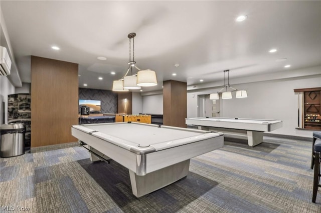 game room featuring a wall mounted air conditioner, pool table, and dark colored carpet