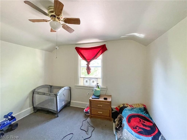 bedroom with ceiling fan and lofted ceiling