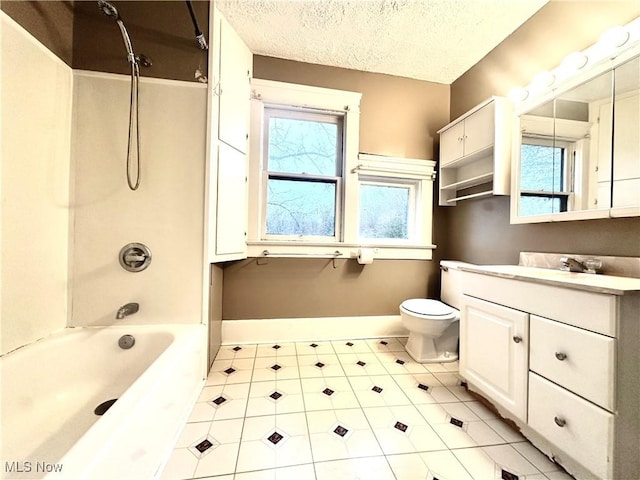 full bathroom with vanity, shower / tub combination, toilet, and a textured ceiling