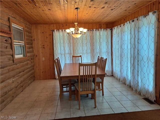 dining space with wooden ceiling, a notable chandelier, log walls, and light tile patterned floors