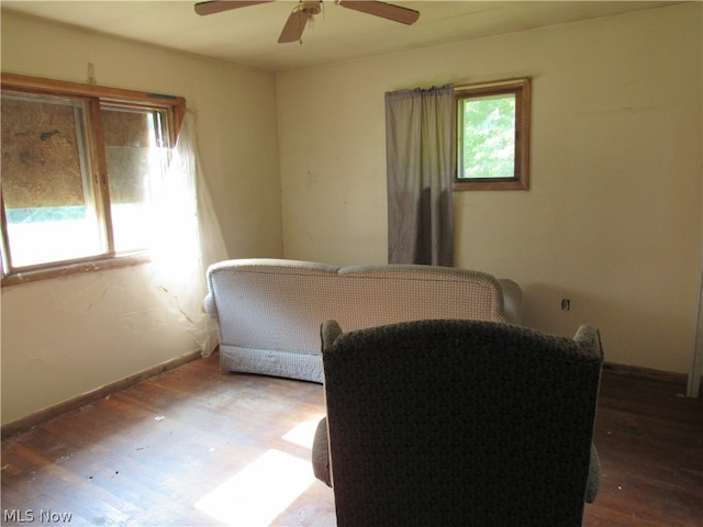 bedroom with ceiling fan and hardwood / wood-style floors