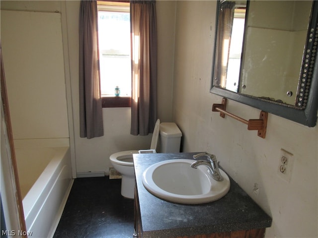 full bathroom with vanity, toilet, and washtub / shower combination