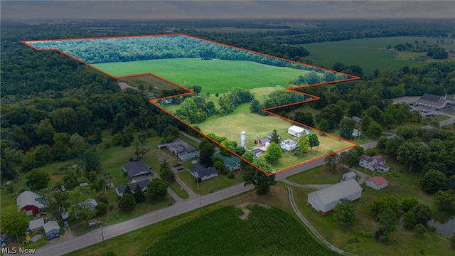 birds eye view of property featuring a rural view